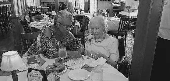 2018 Attitude of Gratitude Annual Holiday Lunch - Volunteer Helping Senior
